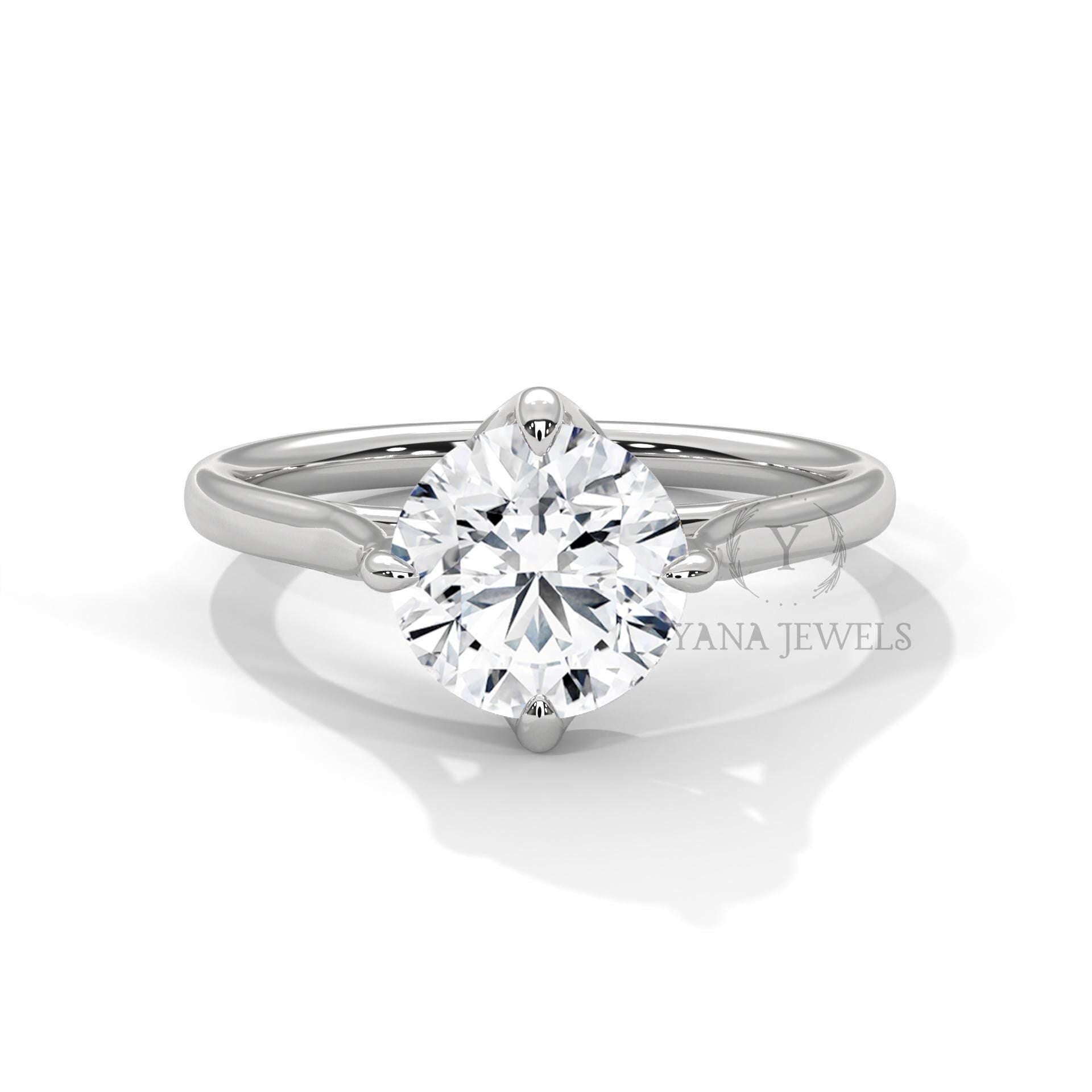 round cut moissanite solitaire engagement ring