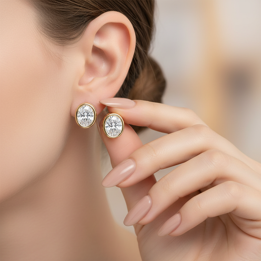 Modern Bezel Set Oval Cut Moissanite Diamond Gold Stud