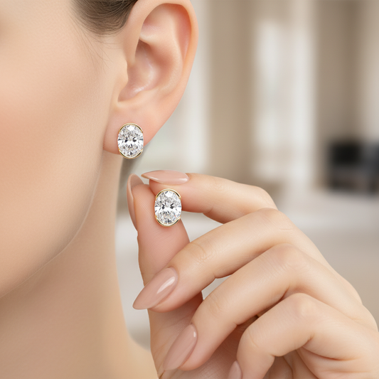 Oval Cut Moissanite Semi Bezel Gold Stud Earrings