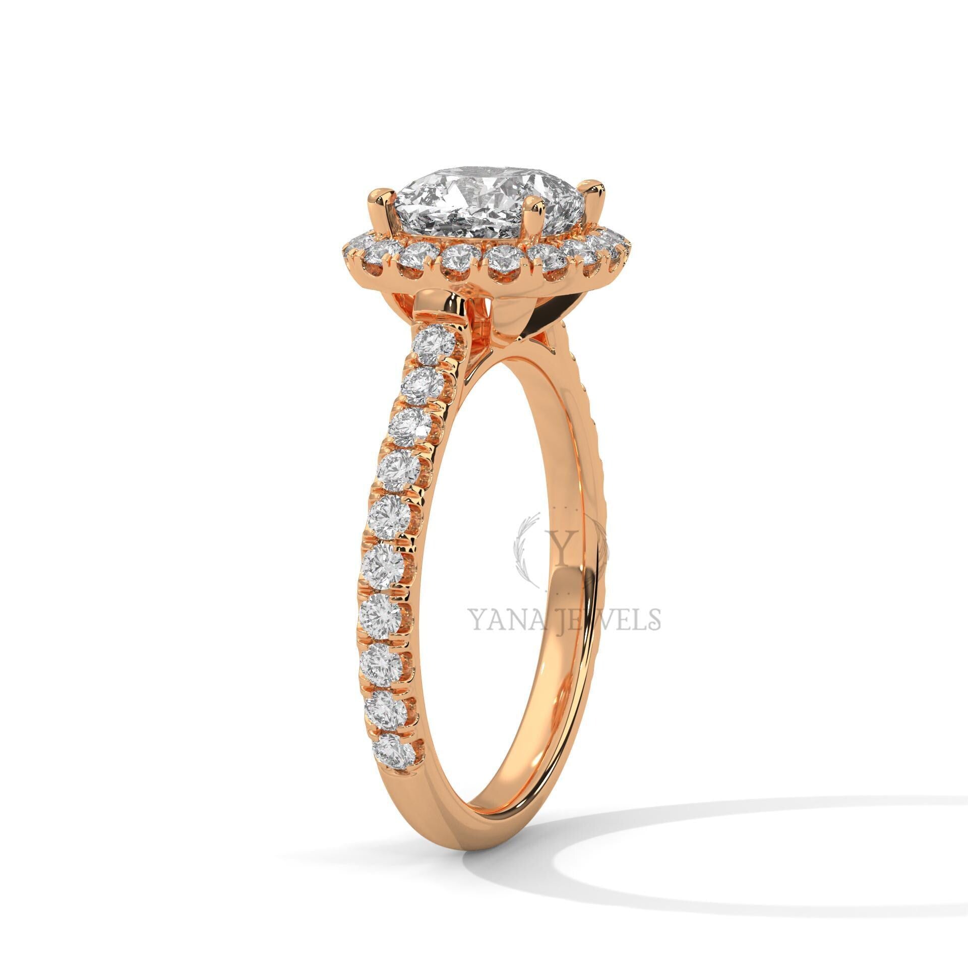 cushion halo moissanite engagement ring in yellow gold