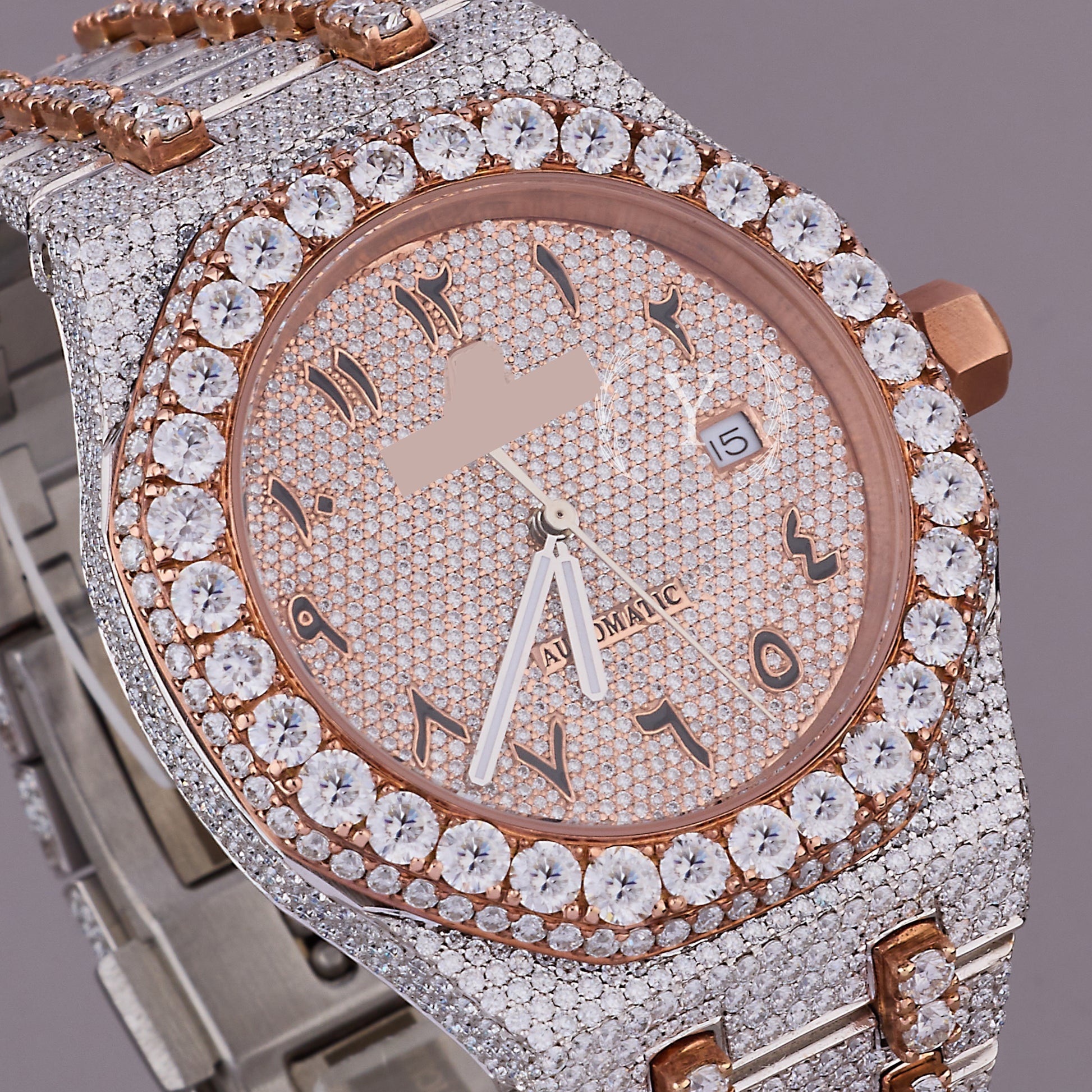 Luxury diamond-encrusted watch with rose gold accents 