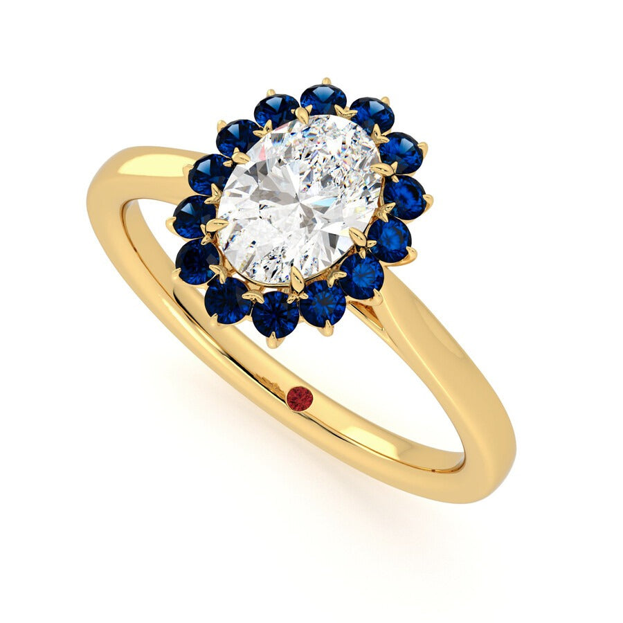 Oval solitaire engagement ring with floral blue sapphire halo