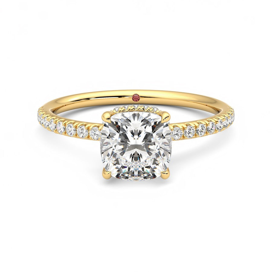 Cushion solitaire engagement ring with hidden diamond halo and pavé band