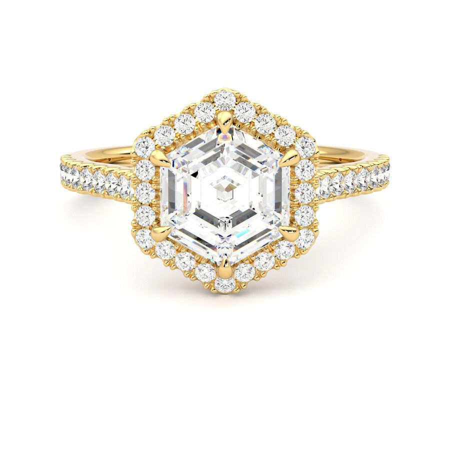 Hexagonal diamond centre and pavé diamond halo engagement ring set in 18ct yellow gold