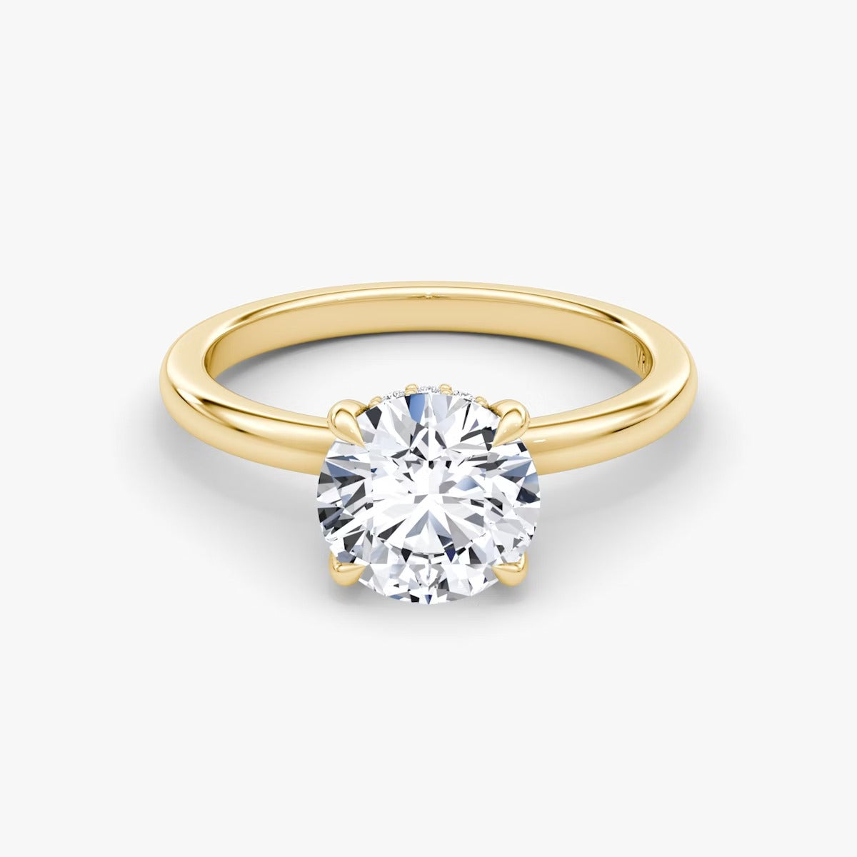 The Floating Solitaire Round Brilliant Engagement Ring